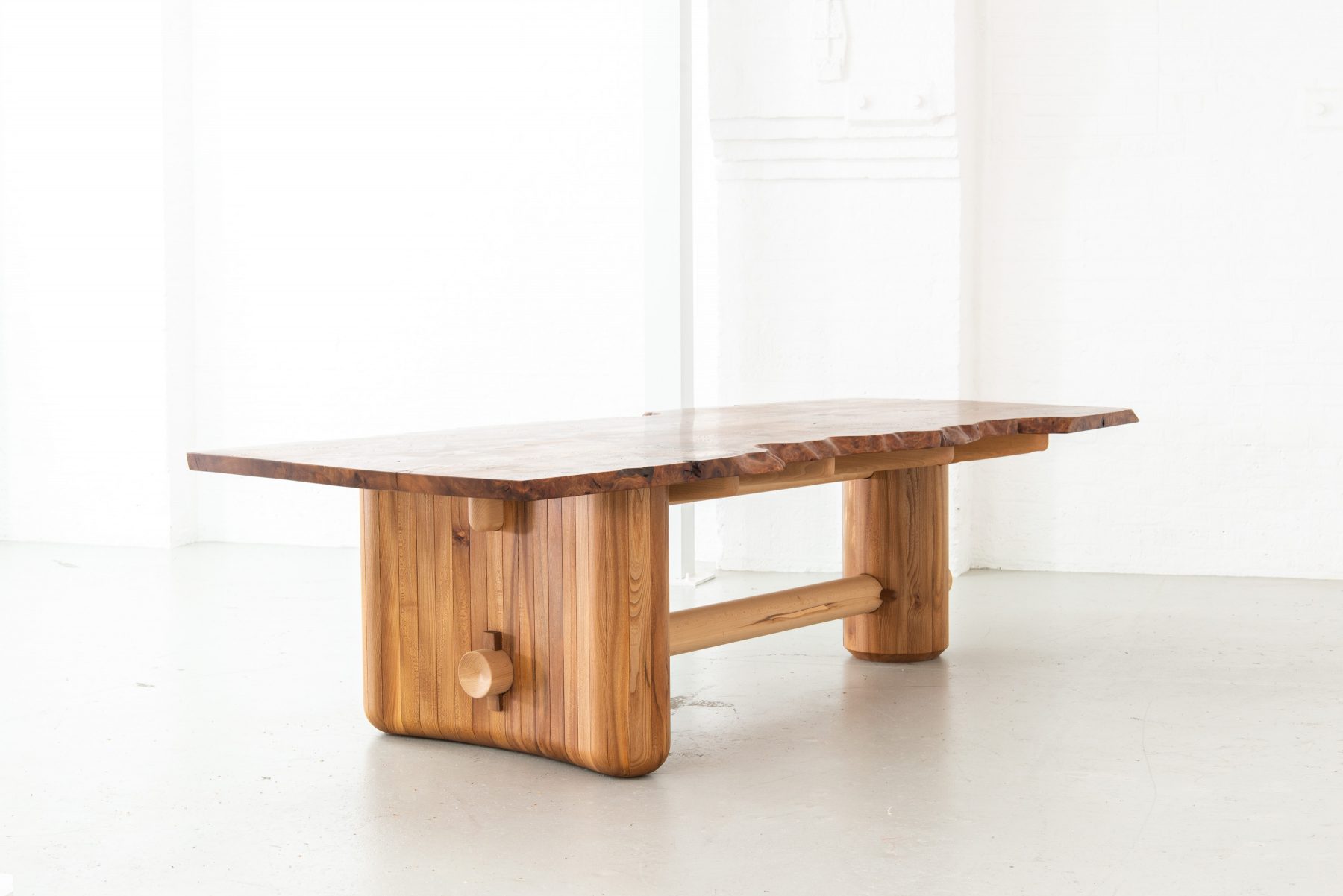 Nakashima-inspired, 12 seater table, made from highly figured Scottish Elm. Inlaid geometric pieces are used to replace surface defects. Hand carved pin-striping and profiling