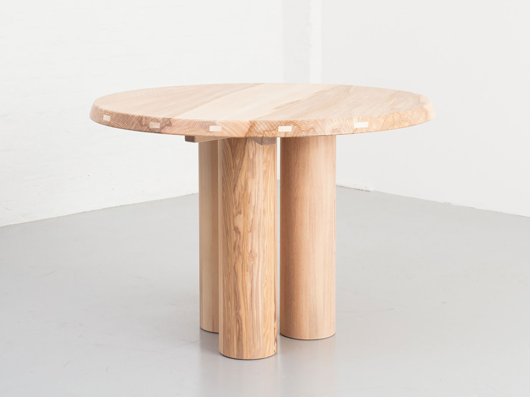 Small Pier round table made from either Scottish Elm or British Oak, 3 staved round legs supported by an all timber frame, table top constructed with loose tongue joinery