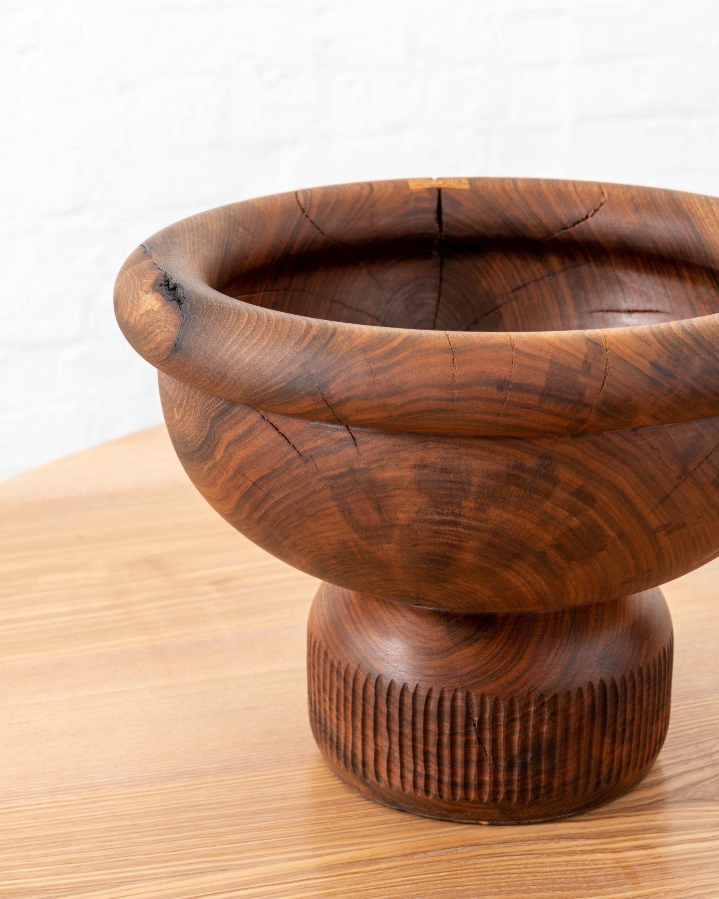 One Legger, Turned and hand carved vessel from a single piece of English walnut. rare timber comes from Dog kennel hill, Camberwell, London. Elm dovetail keys have been utilised to tie the object together.