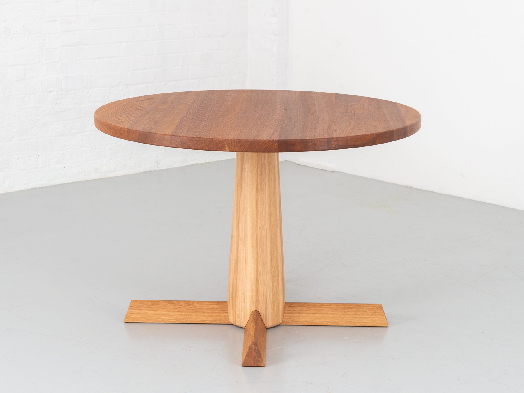 Ruston Round dining table with a Brown Oak table top and turned Oak leg, seats 4 people