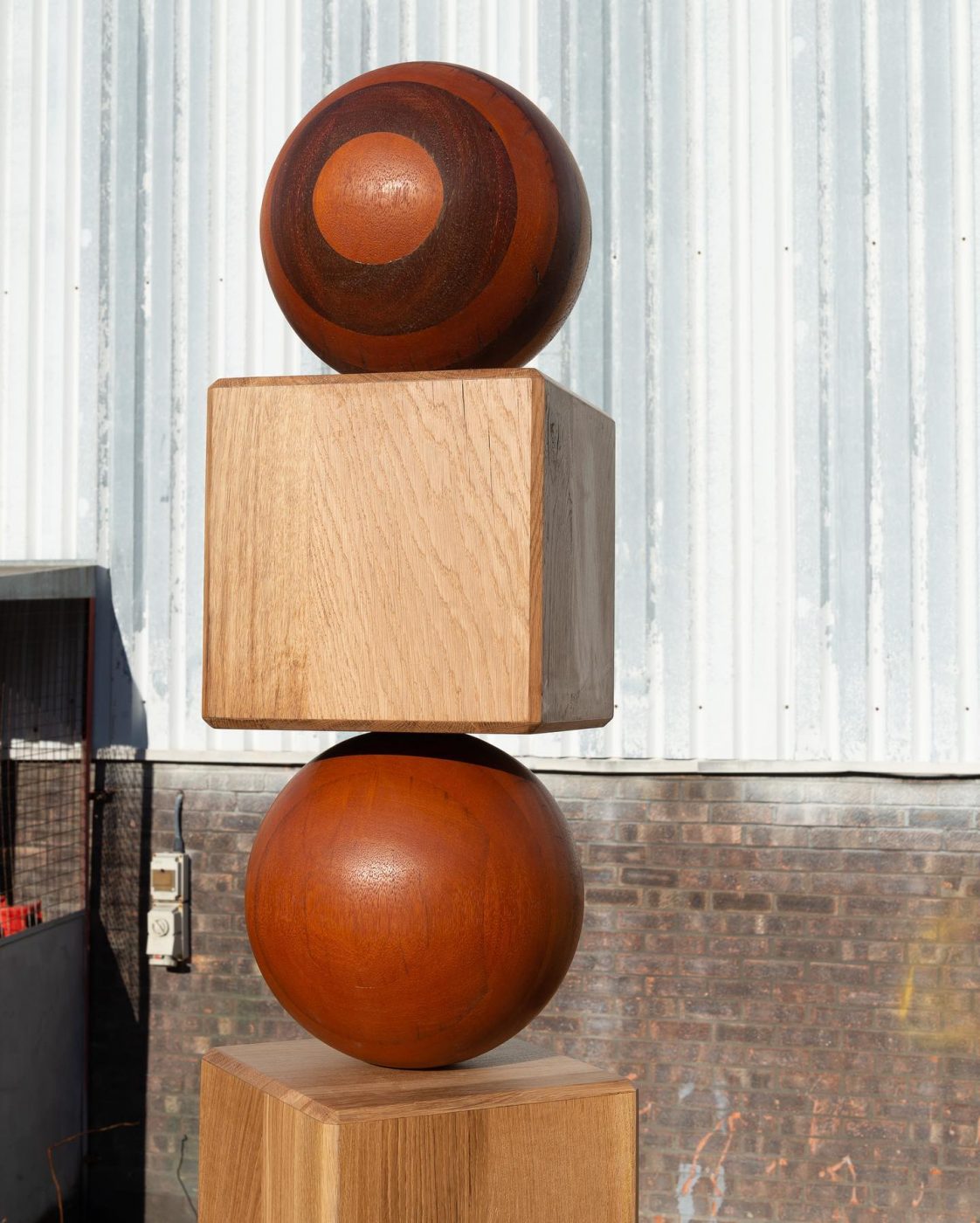 ball-‘n-box-made-using-100-reclaimed-timbers.-the-radiant-rich-rouge-and-burnt-orange-spheres-are-