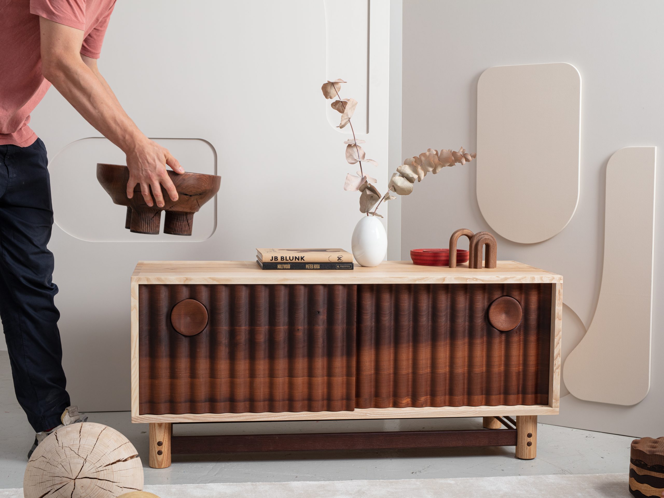 Styling the solid ash Bowater sideboard media unit featuring its signature rippled facade, designed by London furniture maker Jan Hendzel Studio.